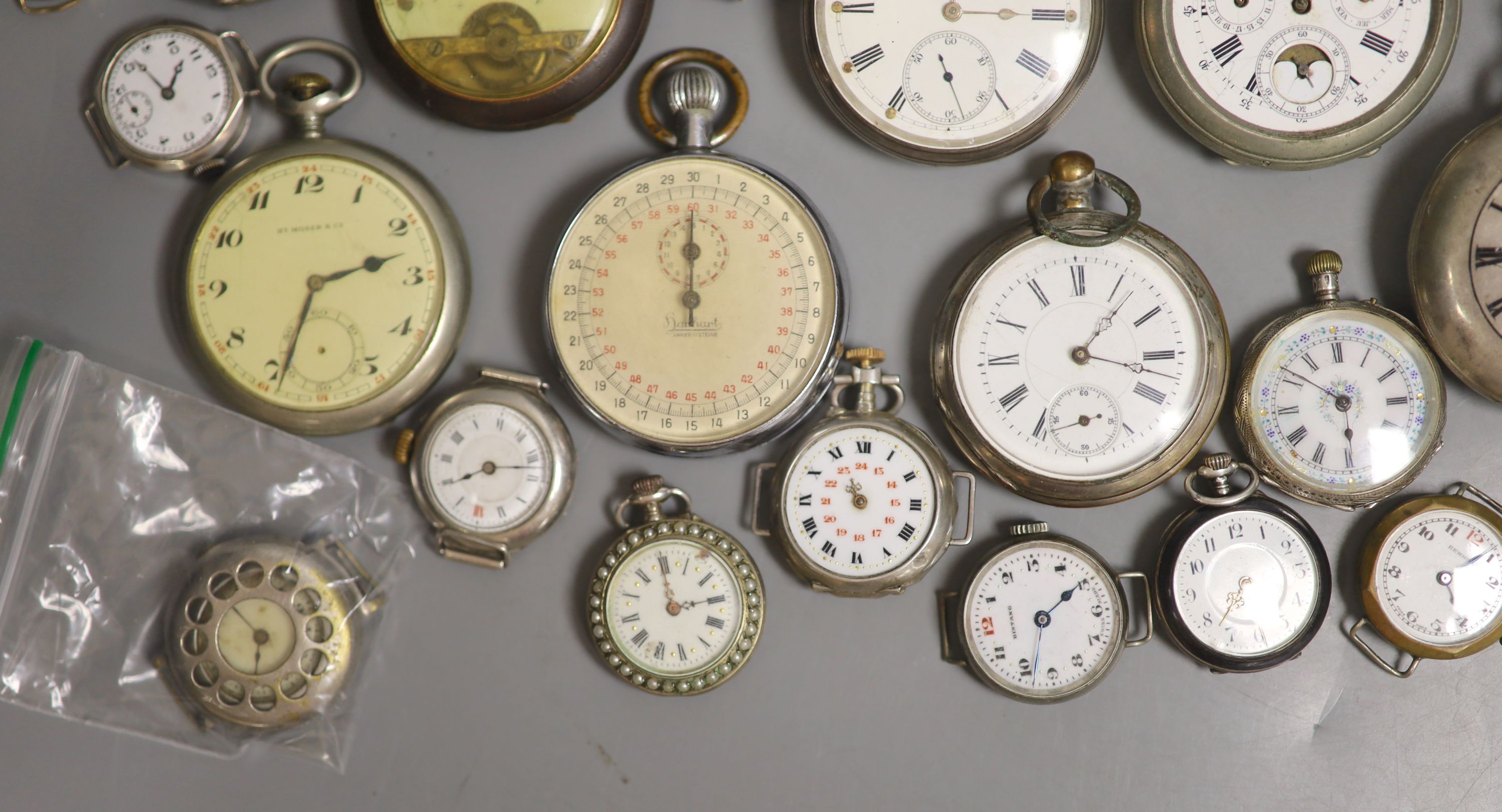 A quantity of assorted pocket, wrist and fob watches including Longines and Zenith, mainly based metal but includes silver and white metal.